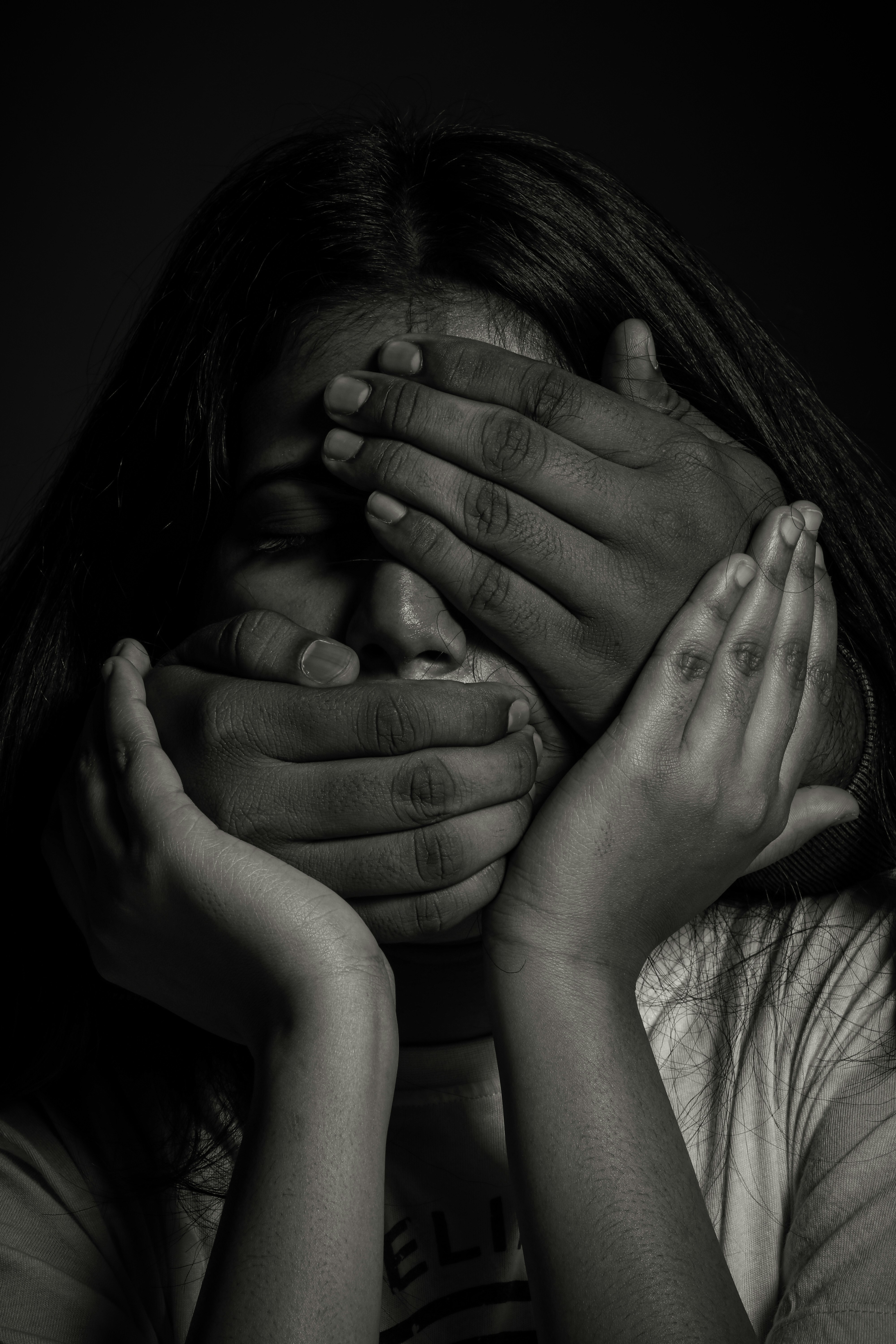 Child with their face covered, representing protection, dignity, and the importance of speaking up